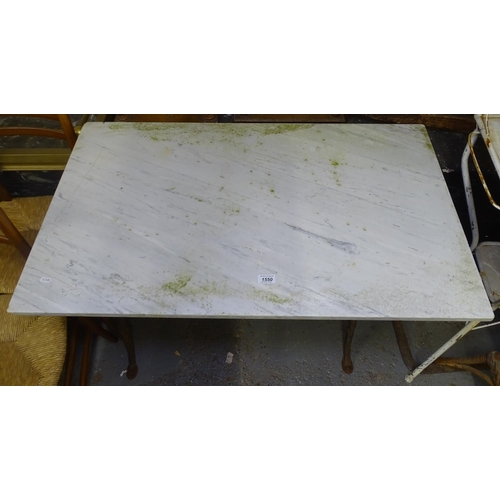 1550 - A white and grey veined rectangular marble-top garden table, with scrolled metal base, W100cm