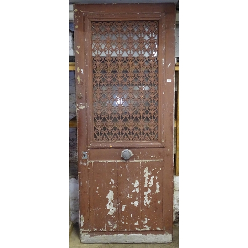 1563 - A French painted front door, with a pierced metal panel, H211cm, W86cm