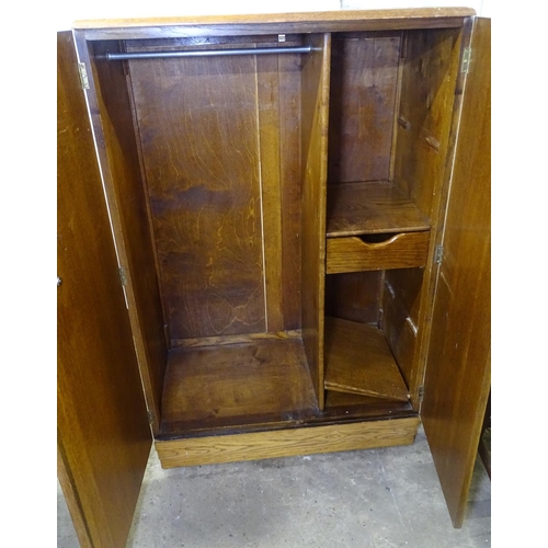 1578 - A 1930s Art Deco oak 2-door compactum wardrobe, W84cm