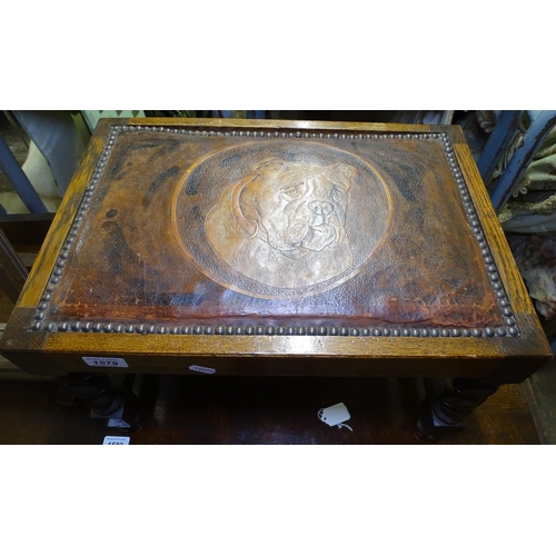 1579 - A 1920s oak barley twist, leather-topped stool, top embossed with a study of a bulldog, W50cm