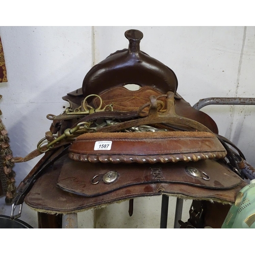 1587 - A full size leather western saddle, and a pair of horse hames