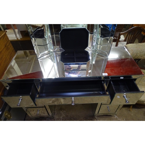 1593 - A modern mirrored glass pedestal dressing table, with 3-fold mirror and matching jewellery box, W118... 