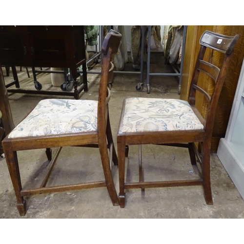 1594 - A pair of Georgian mahogany side chairs, with table top rails and drop in seats