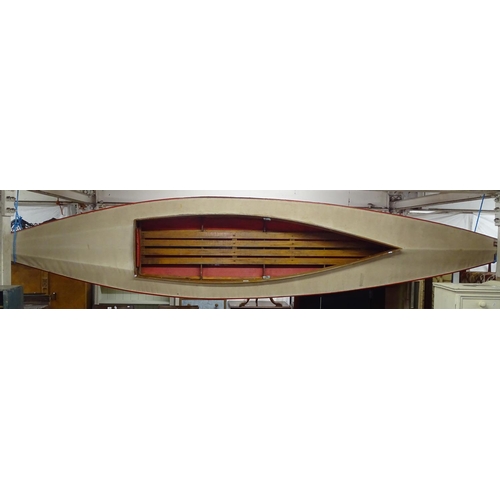 1600 - A mid-century 2 person kayak, fitted with 2 buoyancy bags, the kayak is canvas skinned over a wooden... 