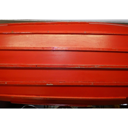 1600 - A mid-century 2 person kayak, fitted with 2 buoyancy bags, the kayak is canvas skinned over a wooden... 