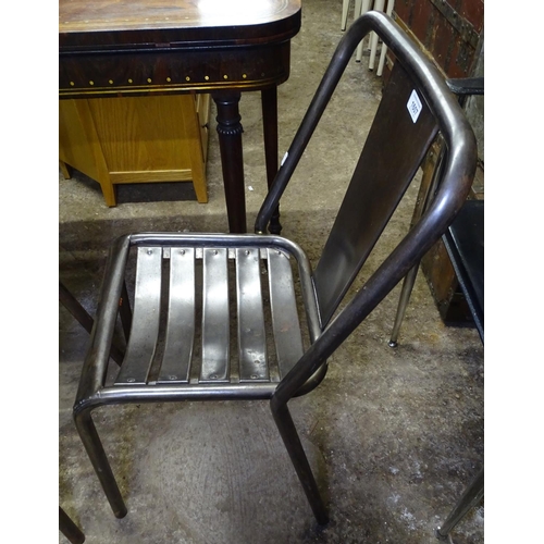 1607 - A pair of French stripped and polished steel cafe chairs