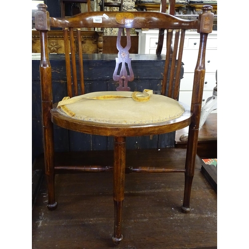 1617 - An Edwardian mahogany bow-arm and marquetry decorated tub chair