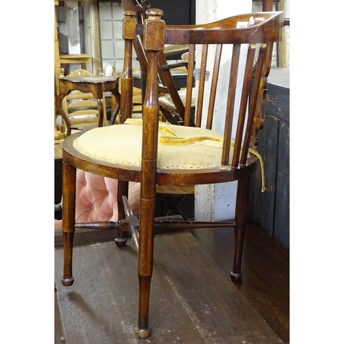 1617 - An Edwardian mahogany bow-arm and marquetry decorated tub chair