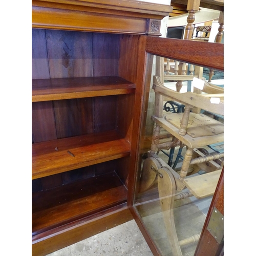 1632 - A Victorian mahogany bookcase, with 2 glazed doors on plinth base, W115cm, H104cm