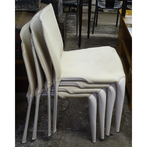 1635 - A set of 4 Cassina Bull dining chairs, designed by Mario Bellini, in cream patent leather with texti... 