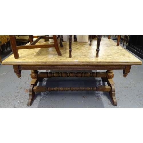 1647 - A Continental oak and cubed parquetry top dining table, raised on baluster turned legs, and bobbin t... 