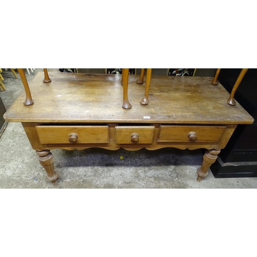 1661 - An Antique pine kitchen dresser base, with 3 frieze drawers, shaped apron, raised on turned legs, L1... 