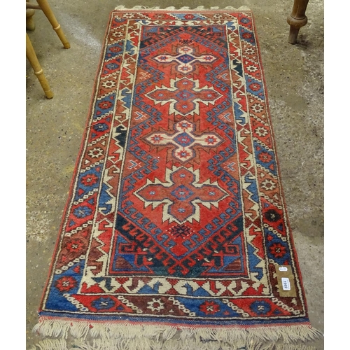 1669 - 2 red ground Afghan rugs, 180cm x 76cm, and 160cm x 73cm