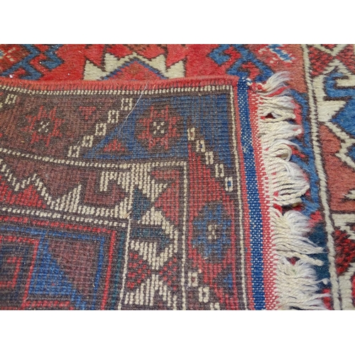 1669 - 2 red ground Afghan rugs, 180cm x 76cm, and 160cm x 73cm