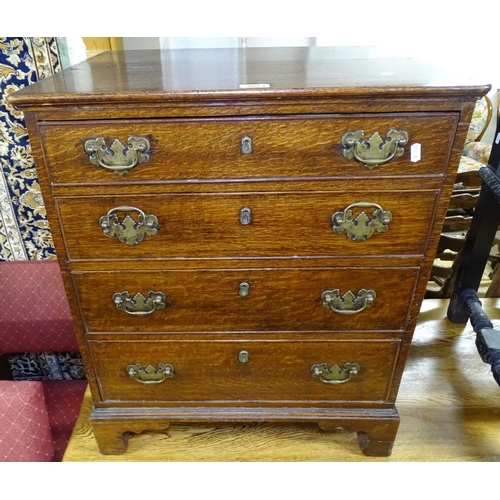 1673 - A small George III oak chest of 4 drawers, on bracket feet, W61cm