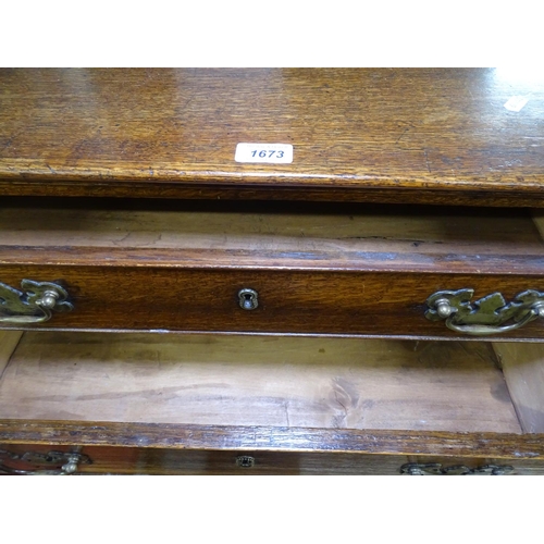 1673 - A small George III oak chest of 4 drawers, on bracket feet, W61cm