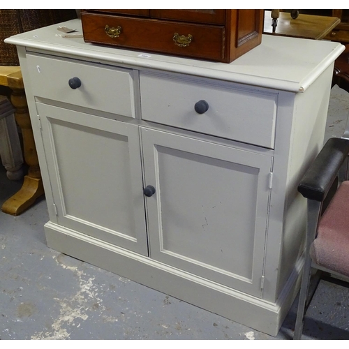 1686 - A painted cupboard with 2 drawers and cupboards under, on plinth base, W105cm