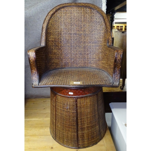 1688 - A unusual Chinese stained wicker chair, on circular barrel base