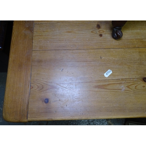 1690 - A rectangular plank top pine refectory kitchen table, on quadruple baluster base, L160cm, H74cm, D77... 