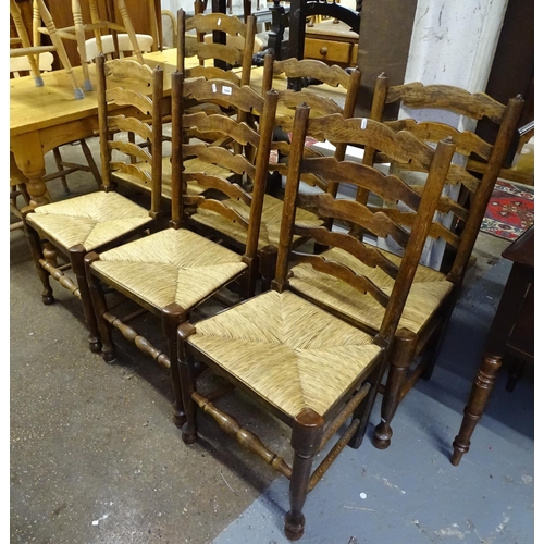 1694 - A set of 6 Antique oak ladder-back and rush-seated Padfoot dining chairs (5 and 1)