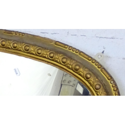 1696 - A 19th century gilt-gesso arch-top over mantel mirror, H128cm, L134cm