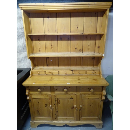 1701 - A modern pine 2-section Welsh dresser, the open plate fitted with spice drawers, above a base of 3 s... 