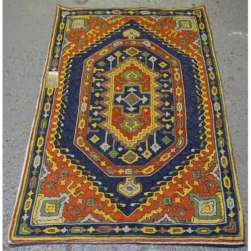 1710 - A Kashmiri wool hand chain stitch rug, 123cm x 72cm