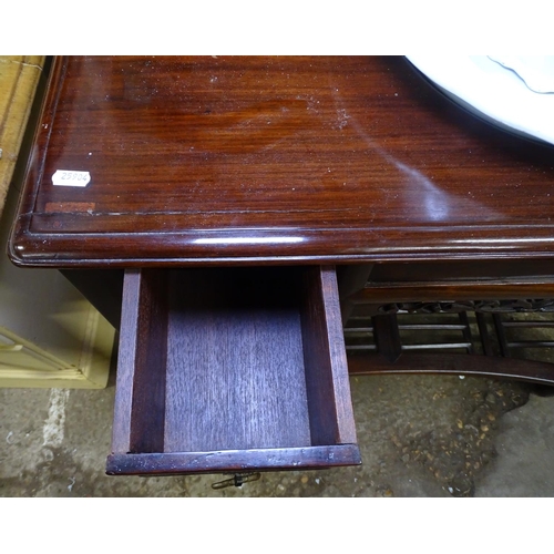 1713 - An Oriental design hardwood washstand, with fitted drawers, wash jug and basin