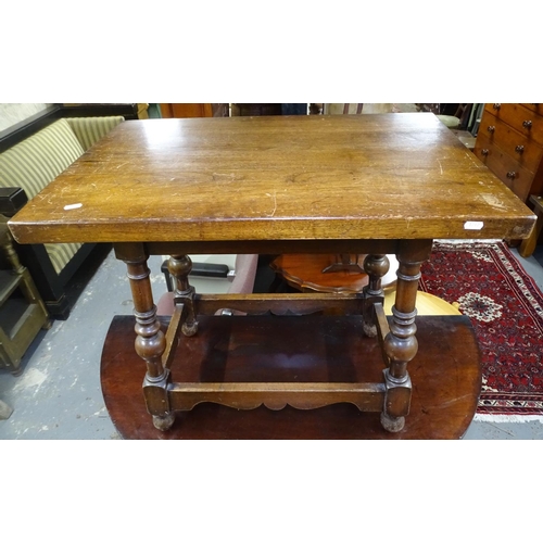 1717 - A 1920s oak octagonal occasional table on turned legs, W76cm