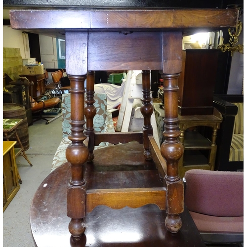 1717 - A 1920s oak octagonal occasional table on turned legs, W76cm