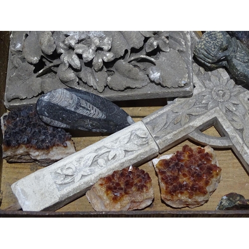 172 - A carved plaster cross, minerals, a bird, a fossil etc