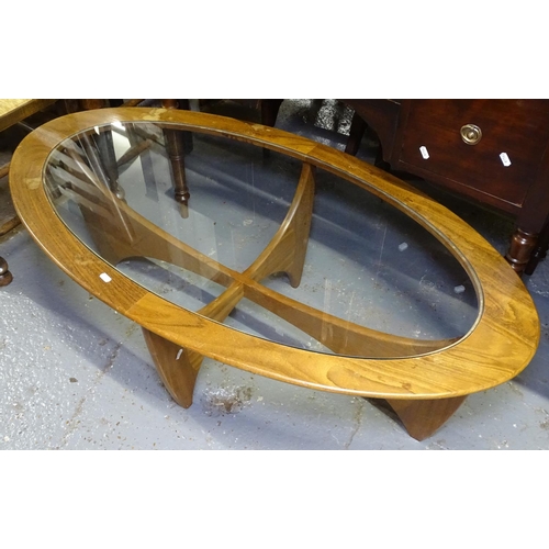 1720 - A mid-century G-Plan teak oval coffee table with glass centre panel, W122cm