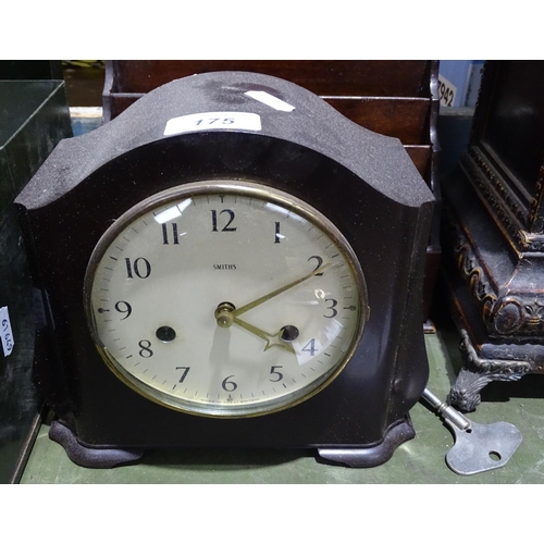 175 - An ornate embossed clock case, 14.5