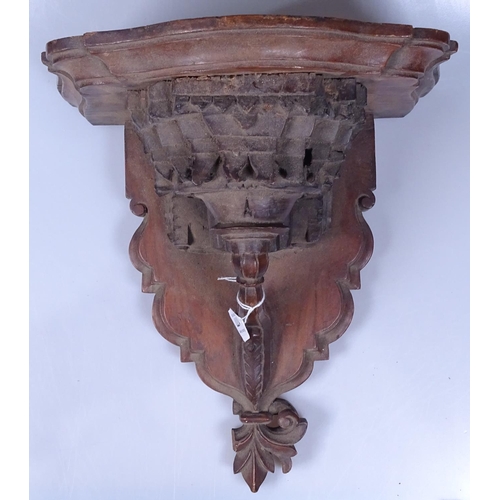 177 - A Victorian carved oak wall bracket, height 13.5