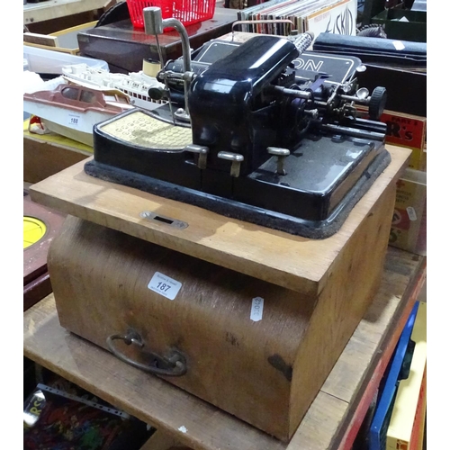 187 - An Antique AEG Mignonon typewriter in original bentwood case