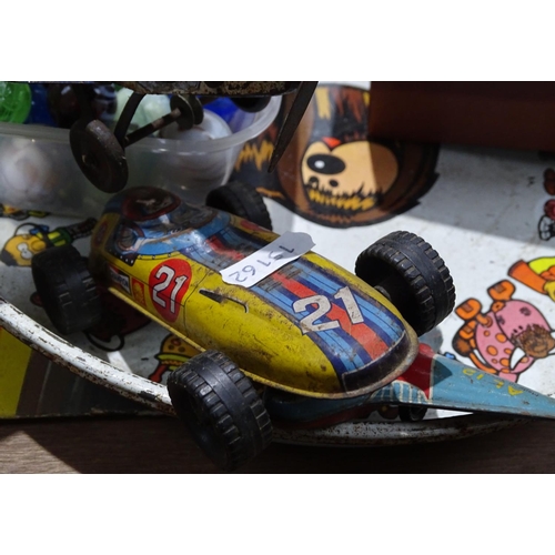 243 - A Staunton chess set, a tin plate, an aeroplane, a racing car, glass marbles etc