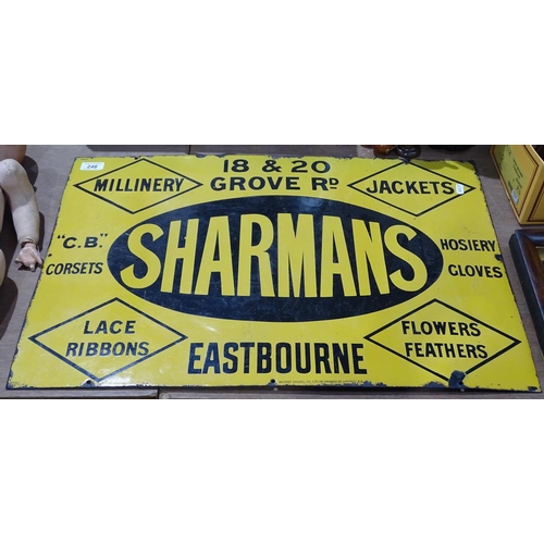 246 - A Vintage enamel advertising sign for Sharmans of 18 & 20 Grove Road Eastbourne, height 18