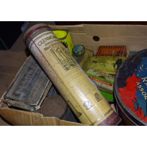 257 - Decorative tins, a 1953 matchbox holder, a Dinky dumper etc