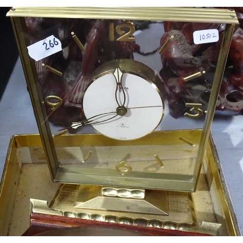 266 - A Tiffany 8-day travel clock, and 2 similar, an 8-day mahogany time piece, and a Swiza 8-day clock