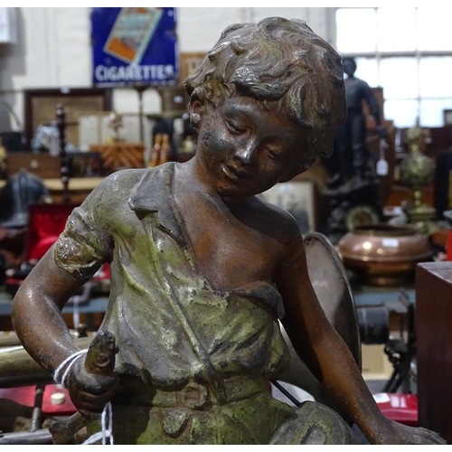 279 - A Continental painted spelter figure of a boy on wooden plinth, 15.5