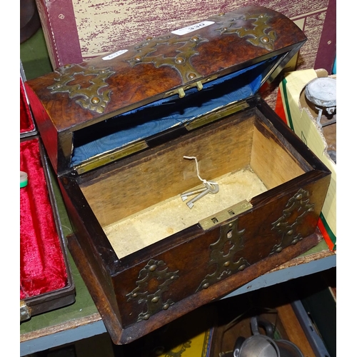 330 - An Antique brass-bound walnut casket, length 9