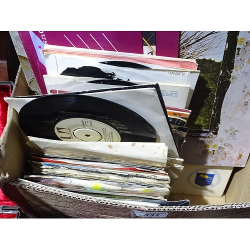 331 - A box of LPs and 45 rpm records