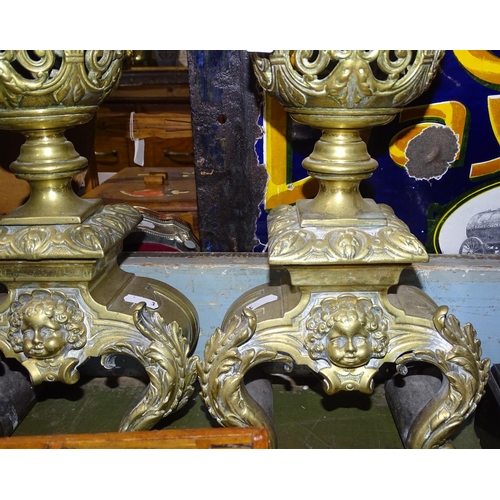 337 - A pair of cast-brass andirons, height 18