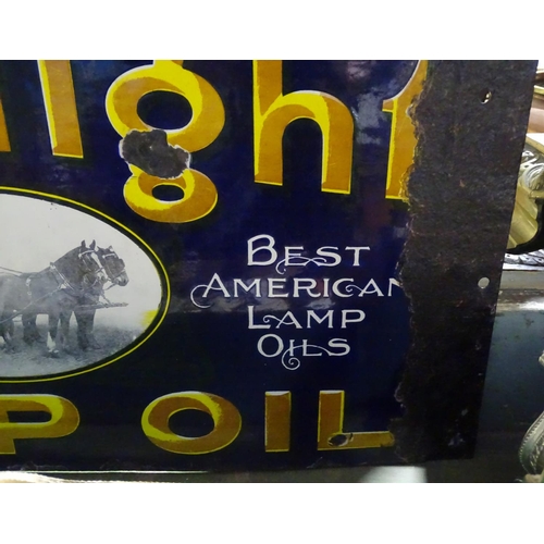 361 - An Antique double-sided enamel sign, advertising Royal Daylight Lamp Oil 