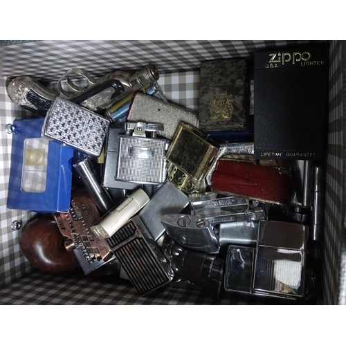 37 - A box of cigarette lighters