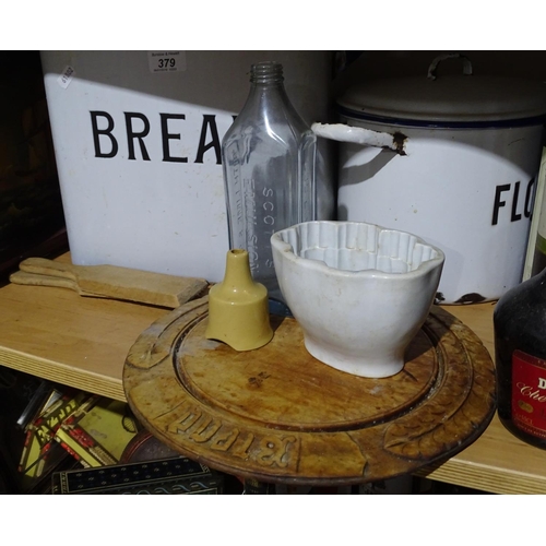 379 - Enamel bread and flour bins, a set of trays etc