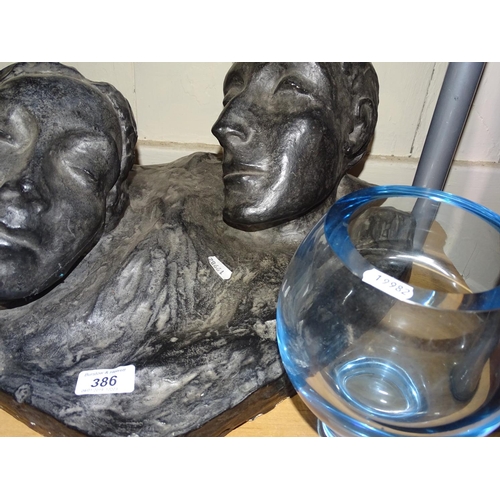 386 - A sculpture, and a blue glass bowl