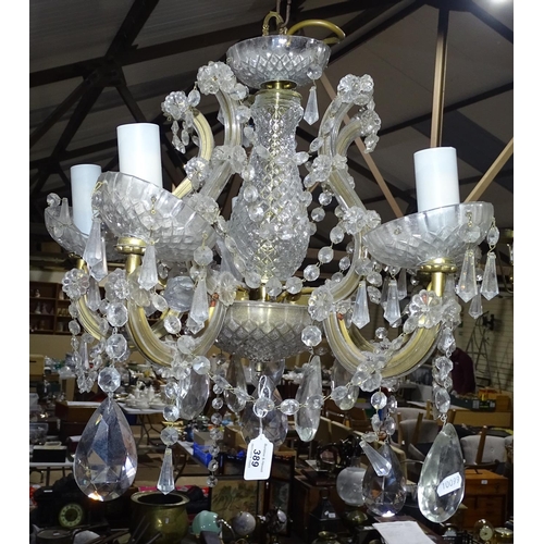 389 - A glass chandelier with lustre drops, 18