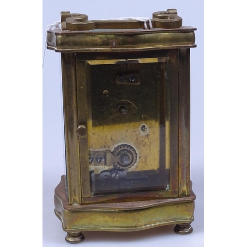 395 - A brass carriage clock on feet, height 4.5