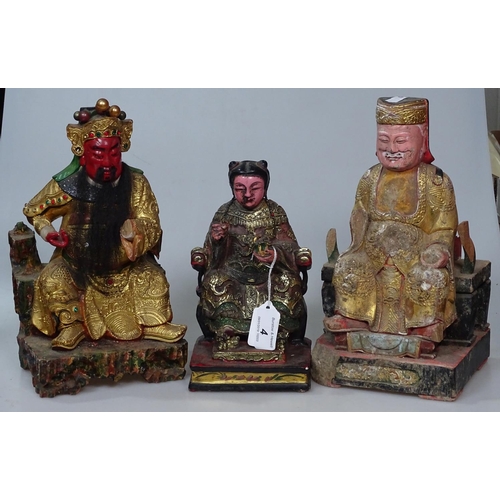 4 - 2 carved and painted wood Oriental seated figures, height 10